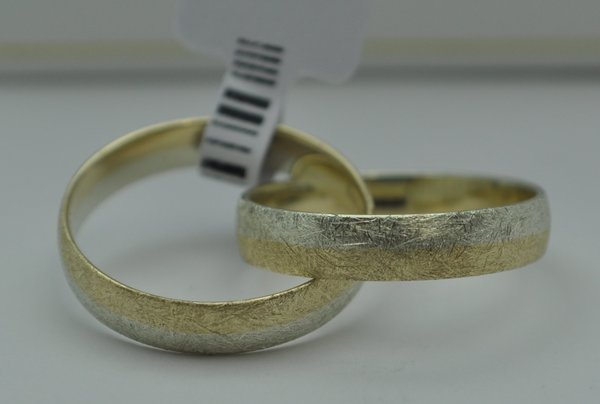 Verschlungene Ringe Gold 333 Bicolor Gelb- / Weißgold Eismatt