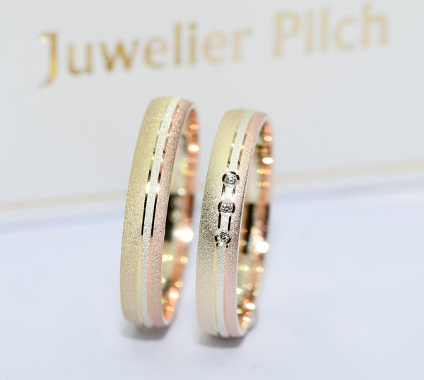1 Paar Trauringe Hochzeitsringe Gold 333 - mit 3 Diamanten 0,01ct - Breite: 4,0 mm